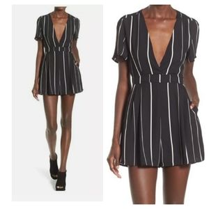 ASTR | Black & White Stripe Romper w/ Deep V Neck